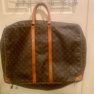 Vintage Louis Vuitton case…(from the 90s) Voyager Duffel…